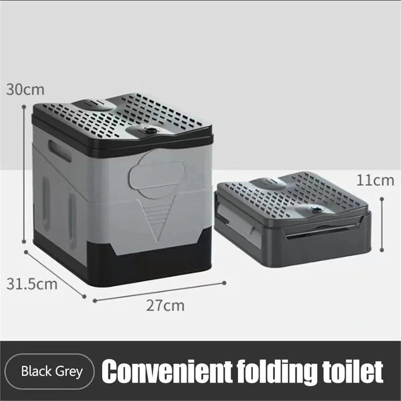 Black and gray folding toilet with dimensions on a white background