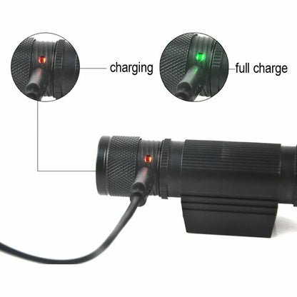 Black electronic device with charging indicator lights on a white background