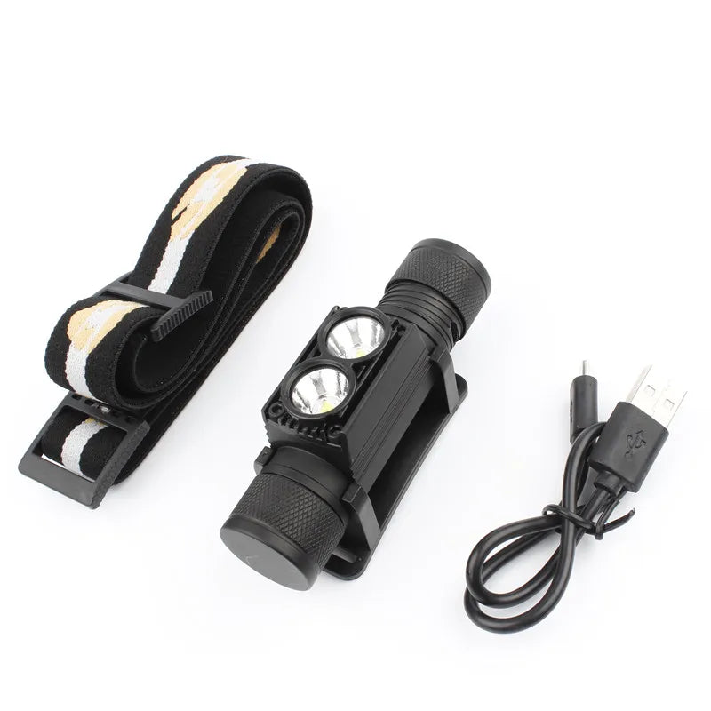 Black flashlight with strap and charging cable on a white background