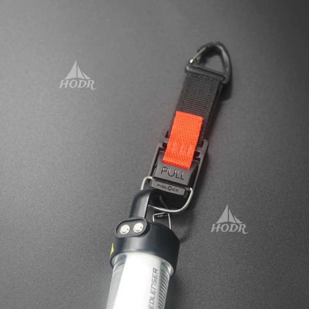 Keychain with pull tab on a gray background, featuring the HODR logo.