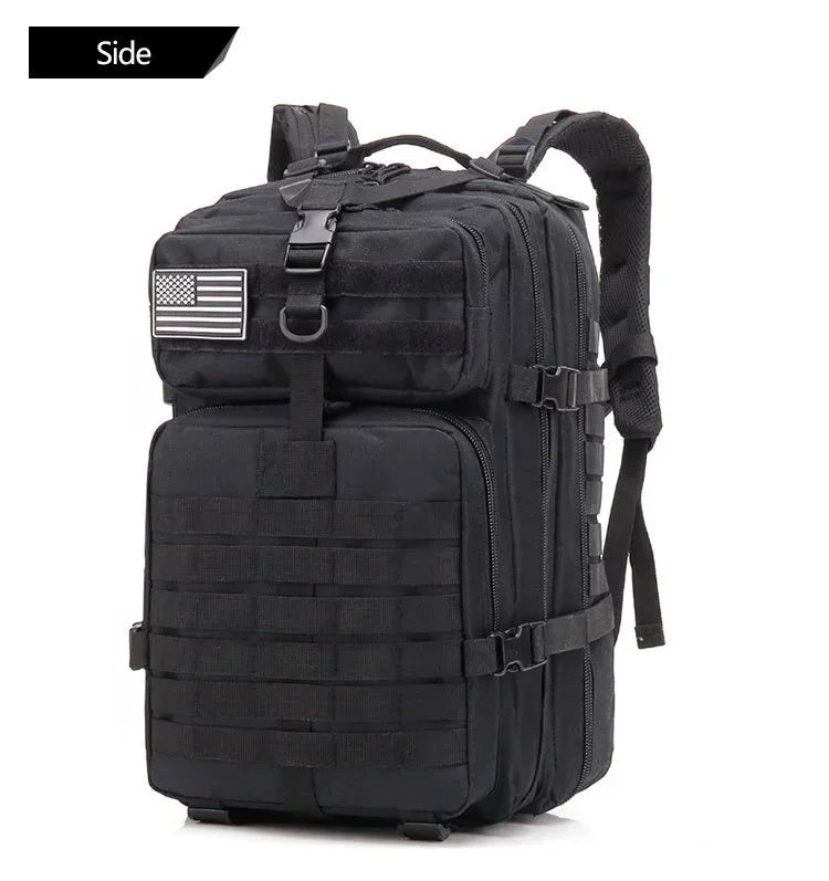 Black tactical backpack with American flag patch on a white background