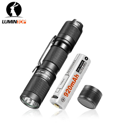 Black flashlight and white battery with 'Luminator' branding on a white background