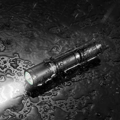 Flashlight on a wet surface with water droplets
