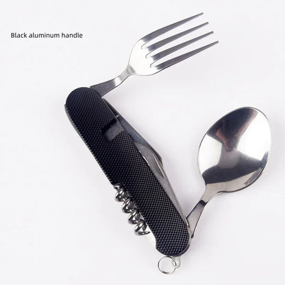 Multitool with black handle and silver fork and spoon on white background