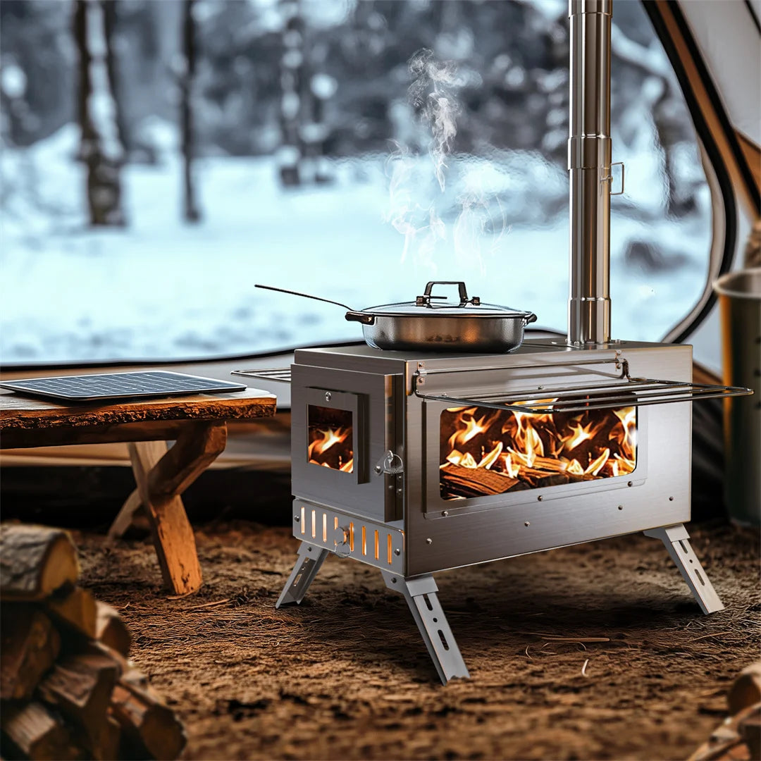Wood stove with pot on top in a snowy outdoor setting