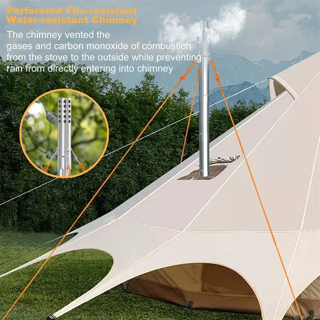Camping tent with a chimney feature, surrounded by trees and mountains.