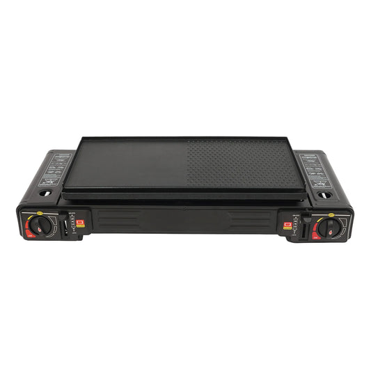 Black griddle with control knobs on a white background