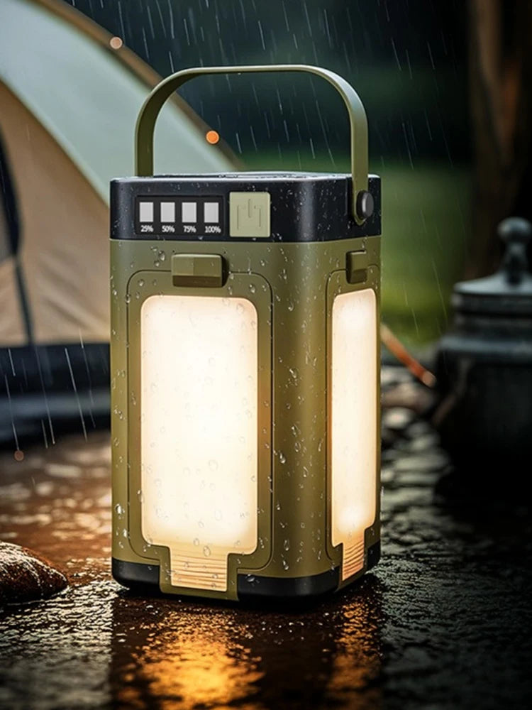 Portable camping lantern with a tent and campfire in the background