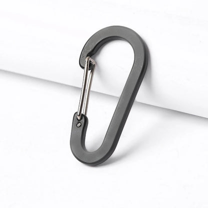 Black carabiner on a white background