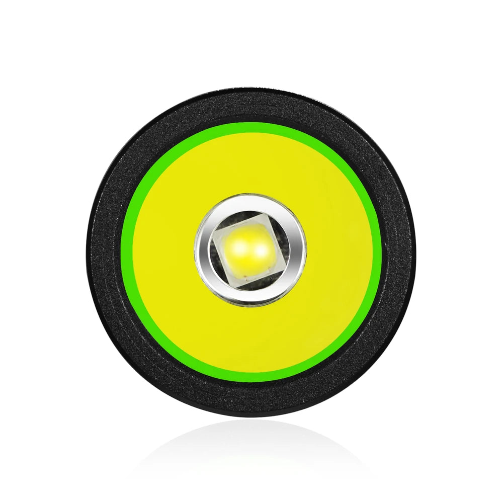 Round LED light with black rim and green center on a white background