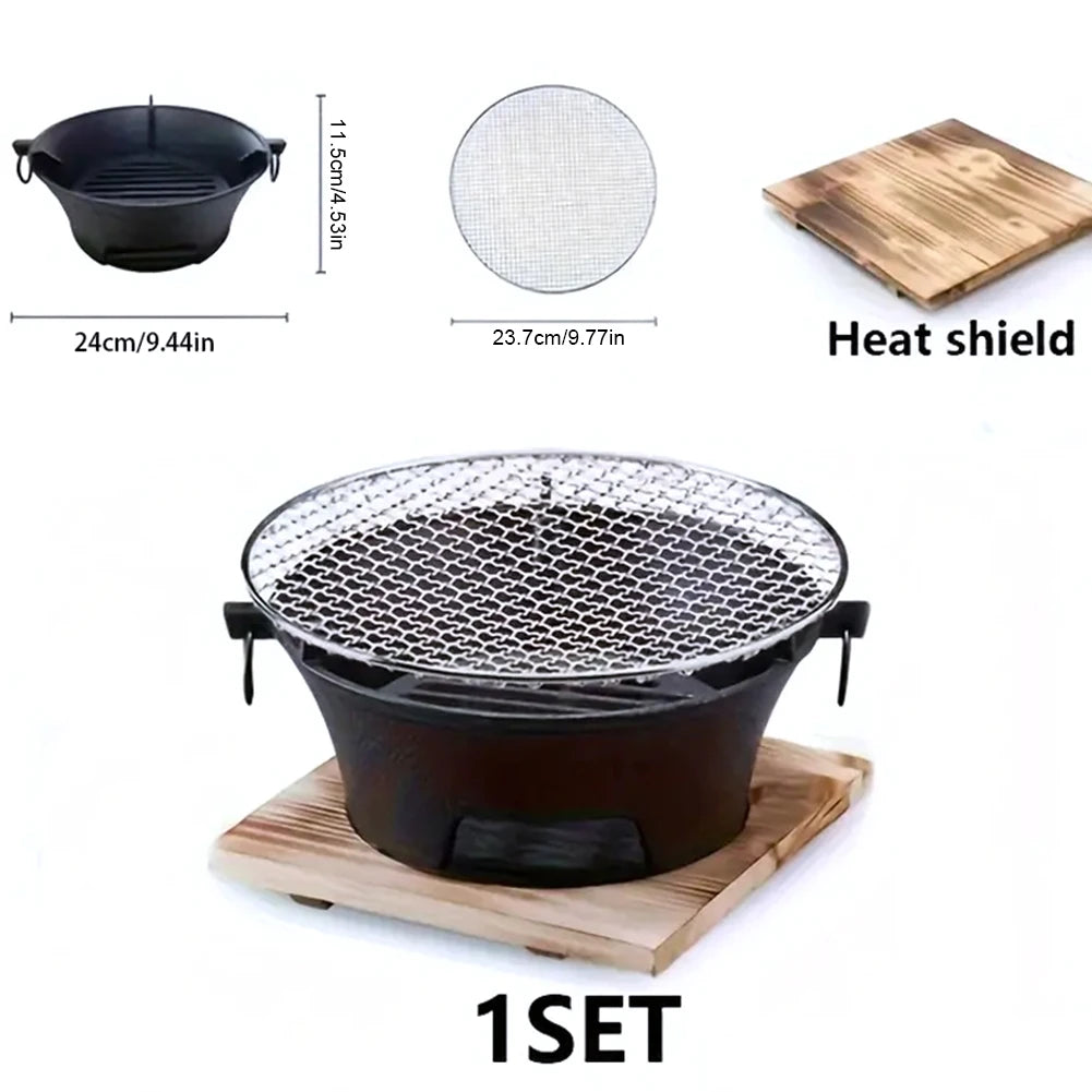 Barbecue grill set with heat shield, mesh, and wooden base on a white background