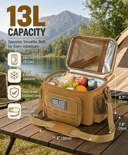 A tan 13L cooler bag shown open on a campsite table by a lake, with mountains and a tent in the background. The bag contains food and drinks, has a visible American flag patch, side mesh pockets, and measurement callouts for size.