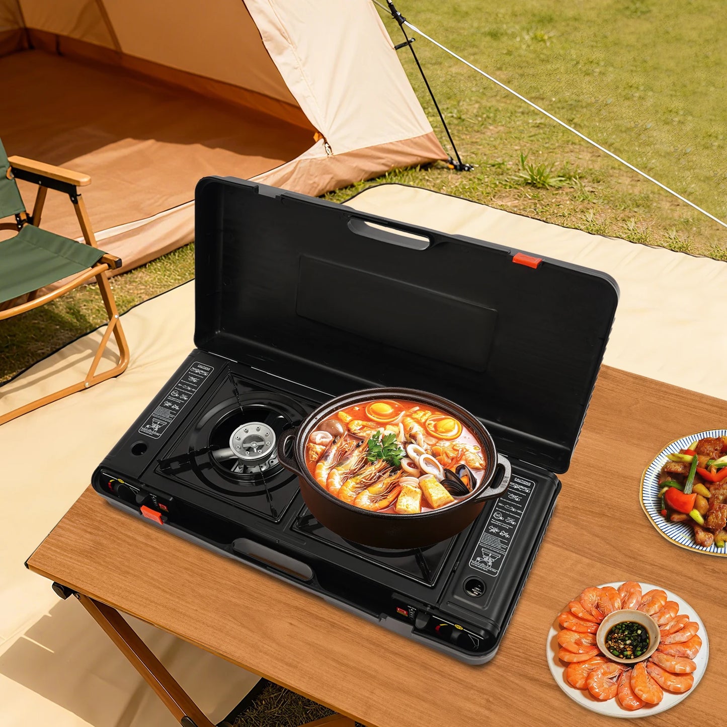 Portable camping stove with a pot of food on a wooden table outdoors.