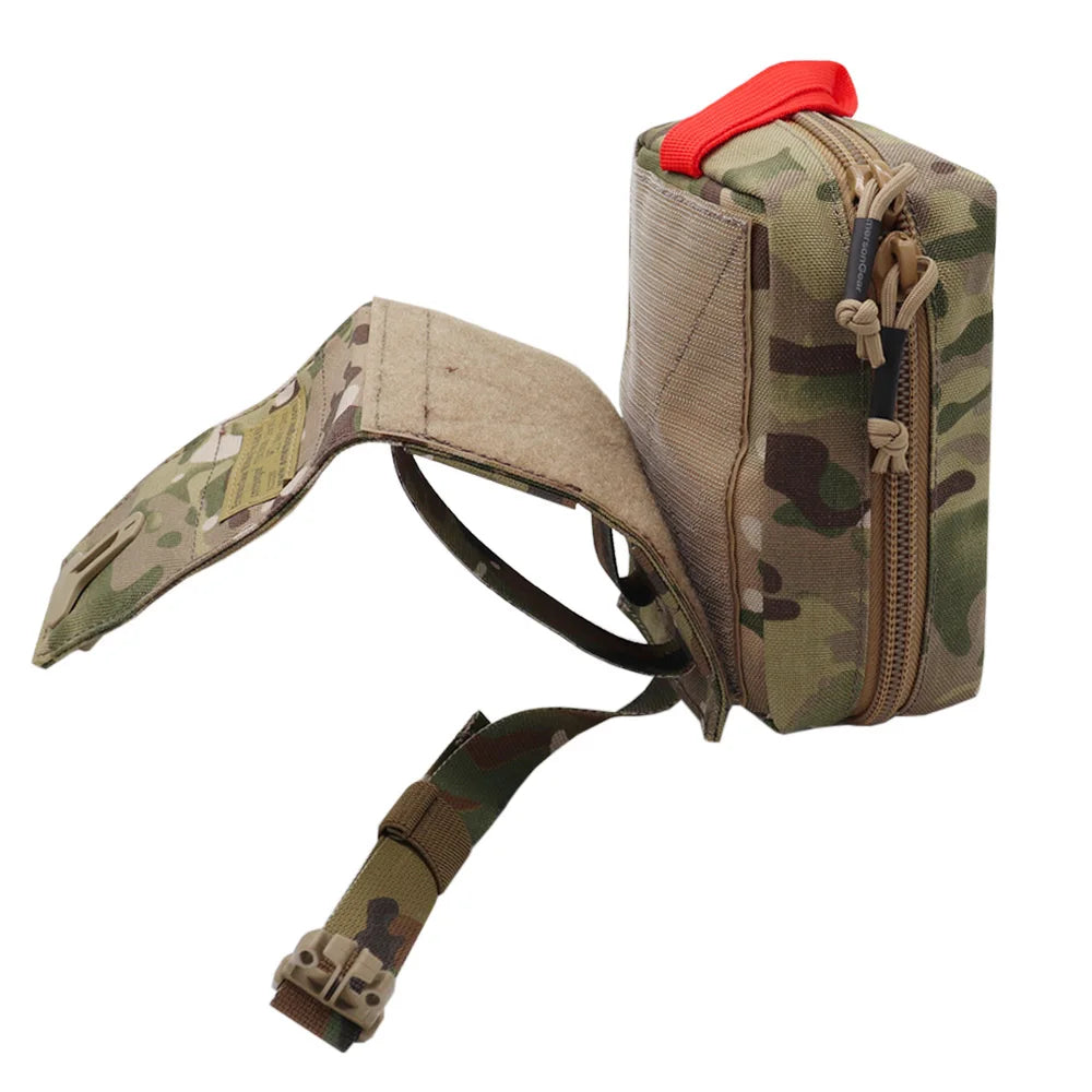 A tactical utility pouch in a green, brown, and beige camouflage pattern, featuring a bright red top handle and an attached adjustable strap with a buckle, shown against a plain white background.