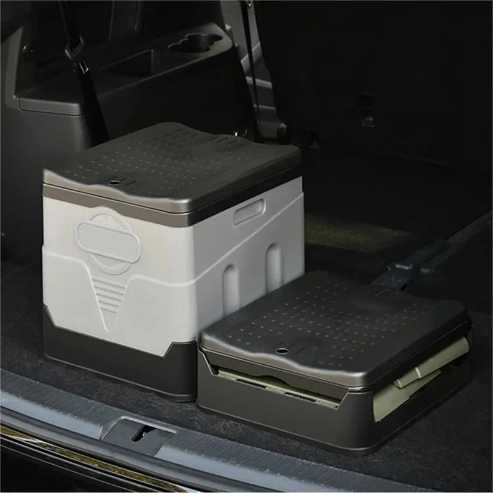 Two storage boxes with a step platform in a vehicle's open trunk.