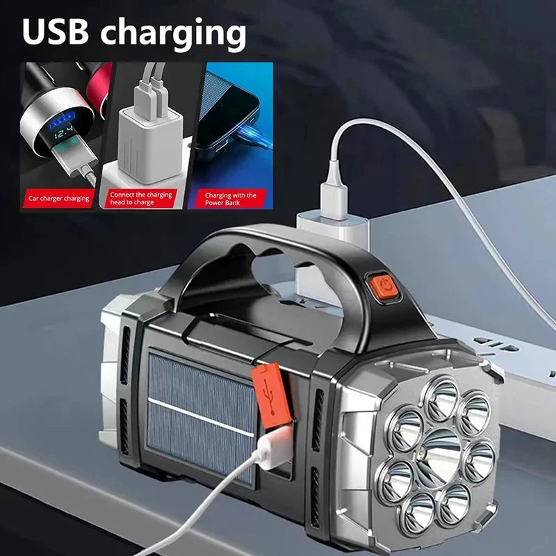 Rechargeable flashlight with USB cable on a dark background