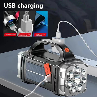 Rechargeable flashlight with USB cable on a dark background