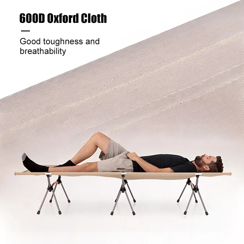 Person lying on a portable cot with 600D Oxford Cloth material, emphasizing toughness and breathability.