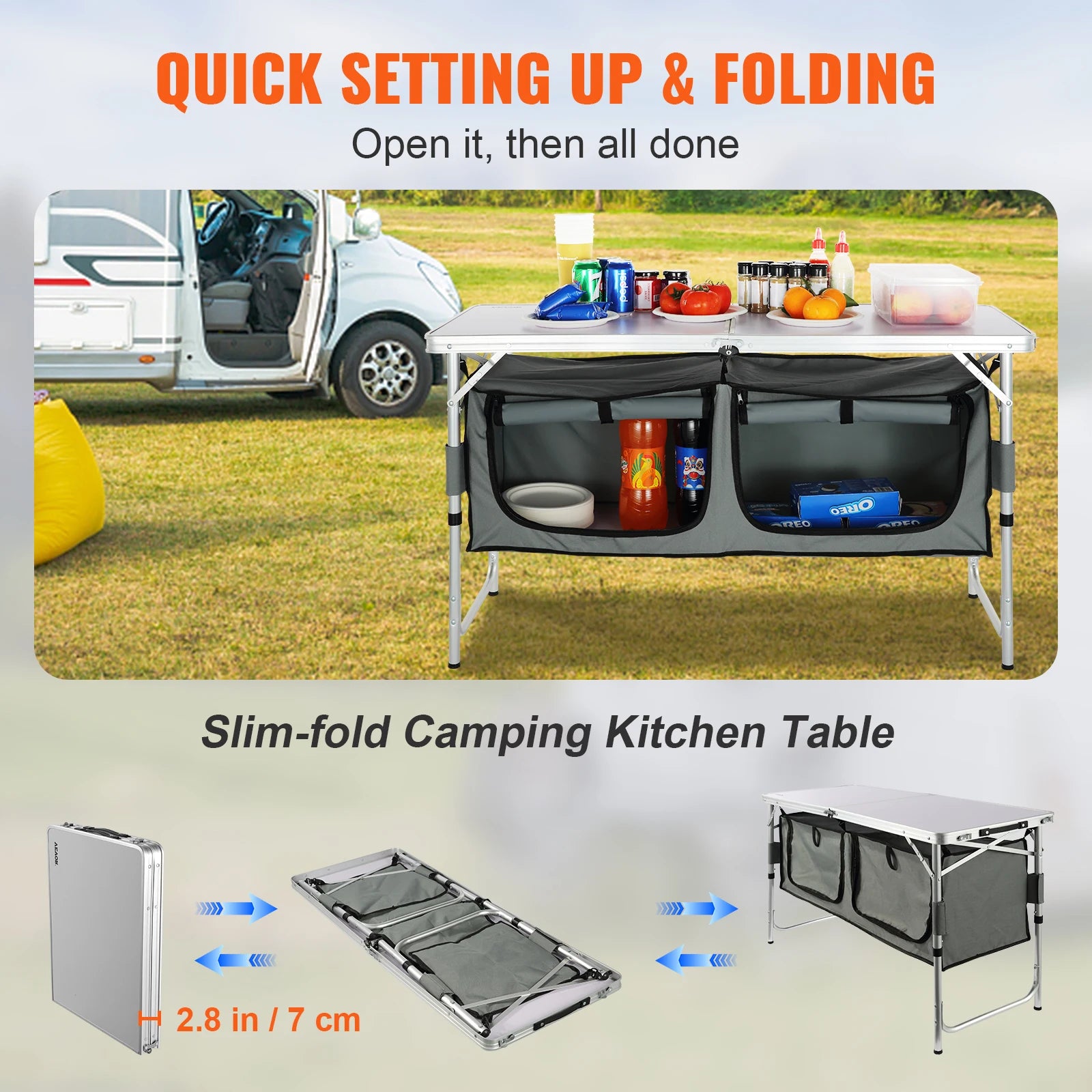 Slim-fold camping kitchen table with storage compartments, set up outdoors with a van in the background.