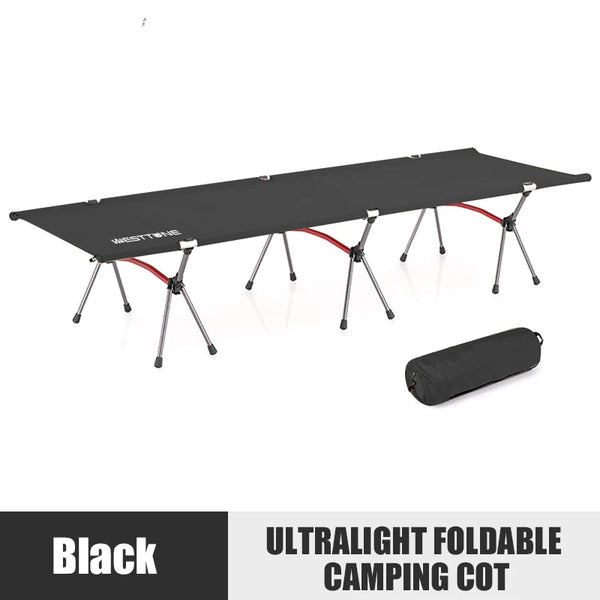 Black ultralight foldable camping cot with carrying bag on a white background