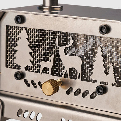 Metallic stove with deer and tree design on a white background