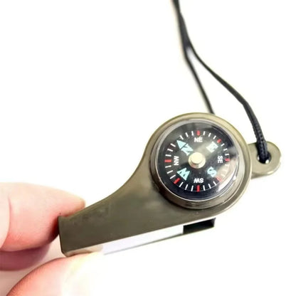 Compass with a neck strap held by a hand on a white background