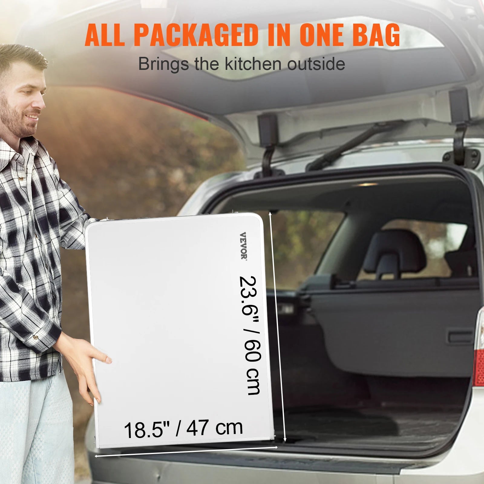 Man holding a large white bag labeled with dimensions, opening a car trunk.