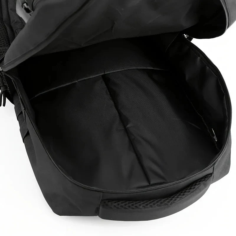 Close-up of a black backpack with a white background
