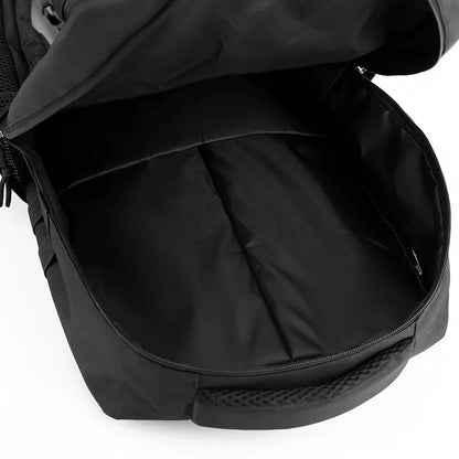 Close-up of a black backpack with a white background