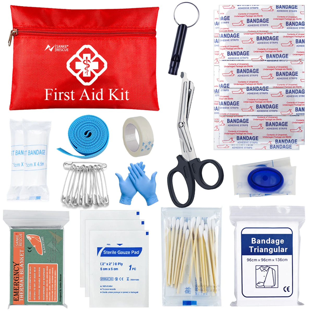 Collection of first aid supplies including a red bag, bandages, scissors, and other medical items on a white background.