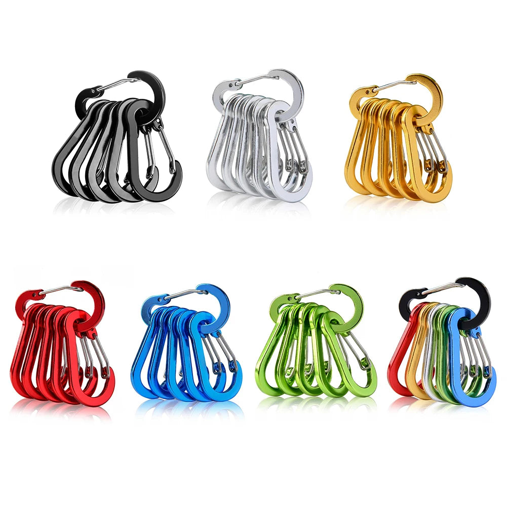 Set of colorful carabiners arranged in a grid on a white background