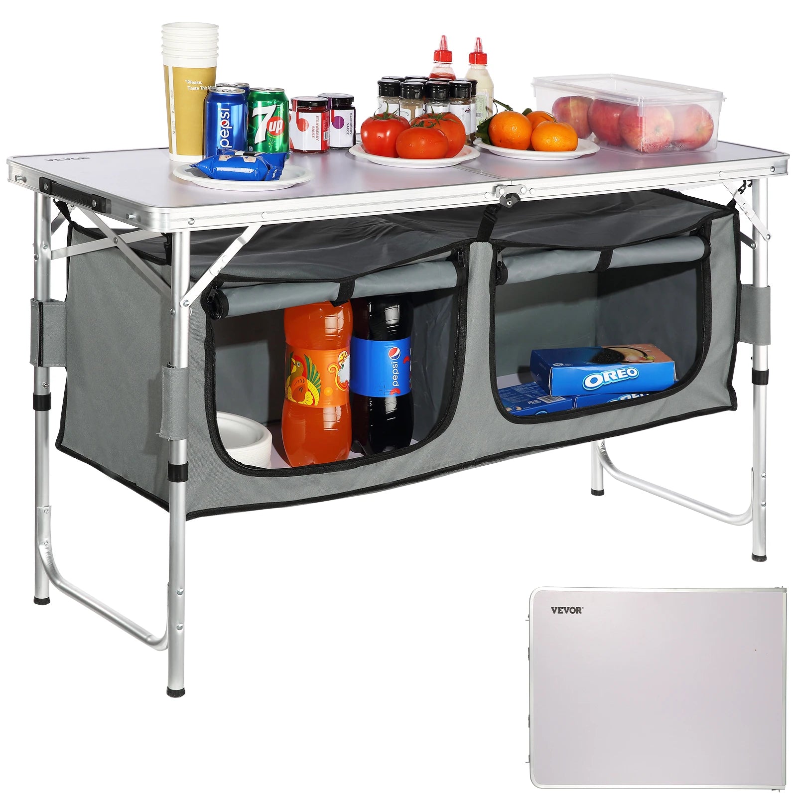 Portable folding table with storage compartments and food items on a white background