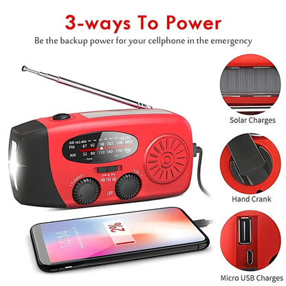 Red and black portable emergency radio with an extendable antenna, shown with a smartphone connected via USB and three circular callout graphics highlighting solar charging, hand cranking, and micro USB charging.