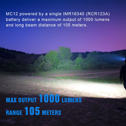 Person using a flashlight in a dark field with text about battery specifications.