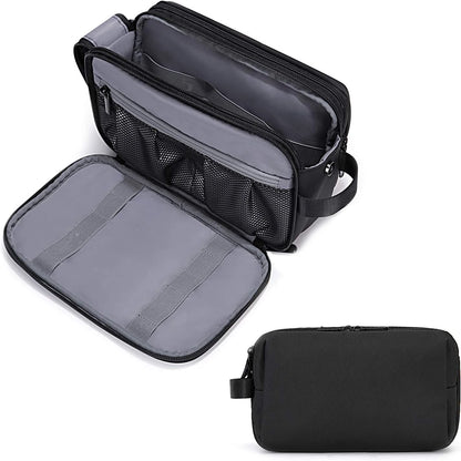 Black travel toiletry bag with open compartments on a white background