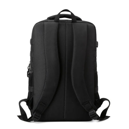 Black backpack shown from the back on a white background