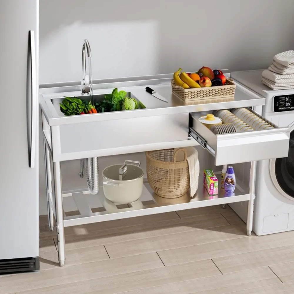 Kitchen utility area with sink, fruit basket, and laundry cart.