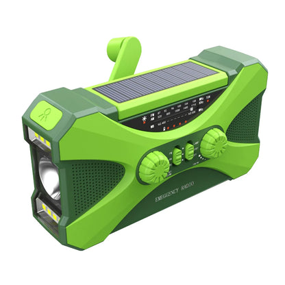Green emergency radio with solar panel on a white background