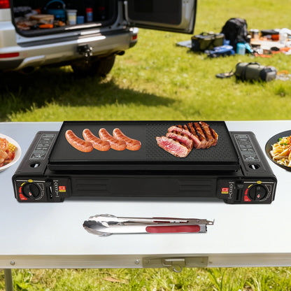 Portable griddle on a table with food being cooked, outdoors.