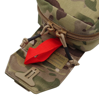 Close-up of a camouflage utility pouch with a red zipper pull tab, beige webbing, and a tan plastic buckle, shown on a white background.