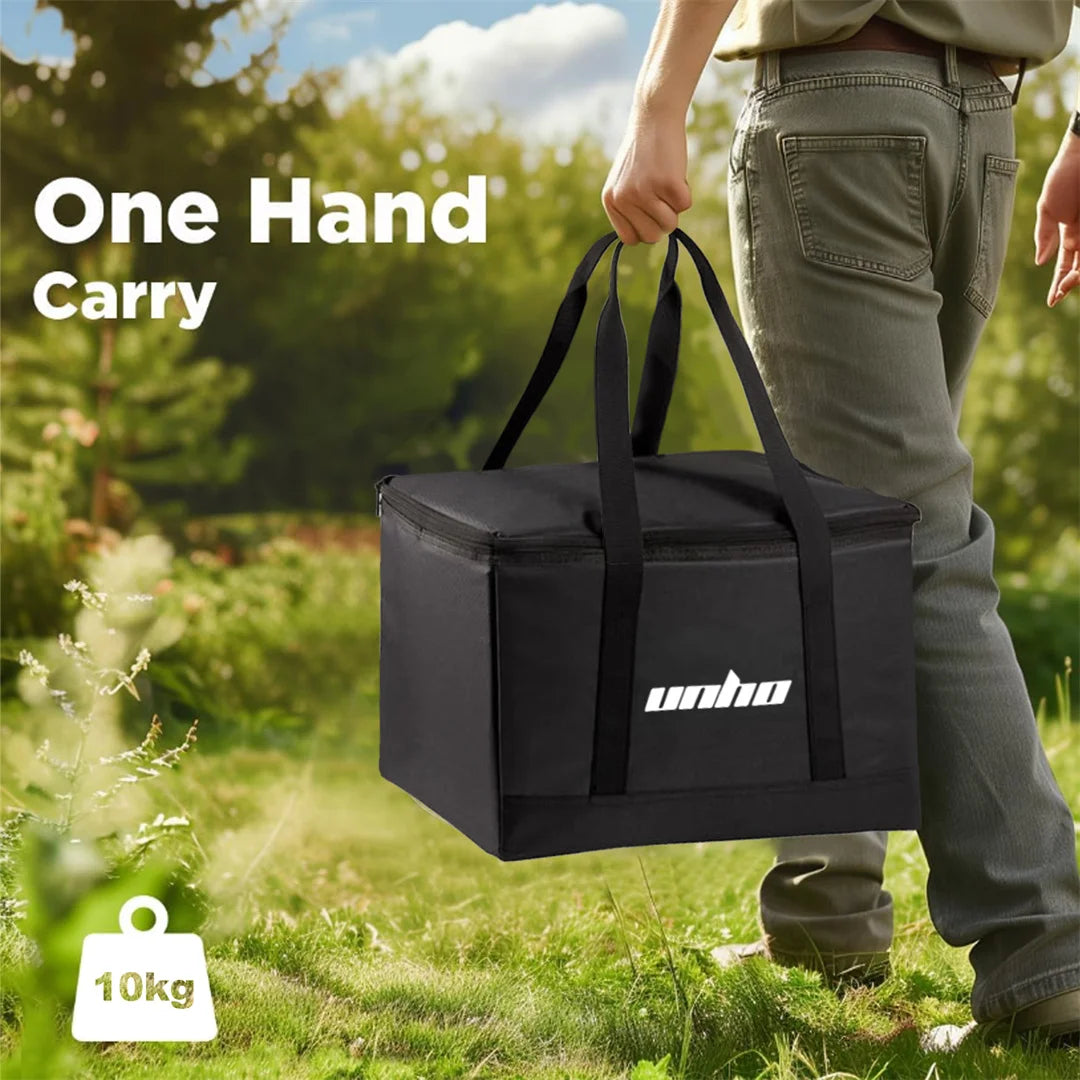Person carrying a black bag with 'UNHO' branding outdoors