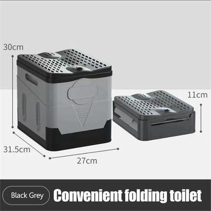 Black and gray folding toilet with dimensions on a white background