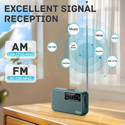 Green radio on a wooden surface with signal reception diagram and text about AM and FM frequencies.