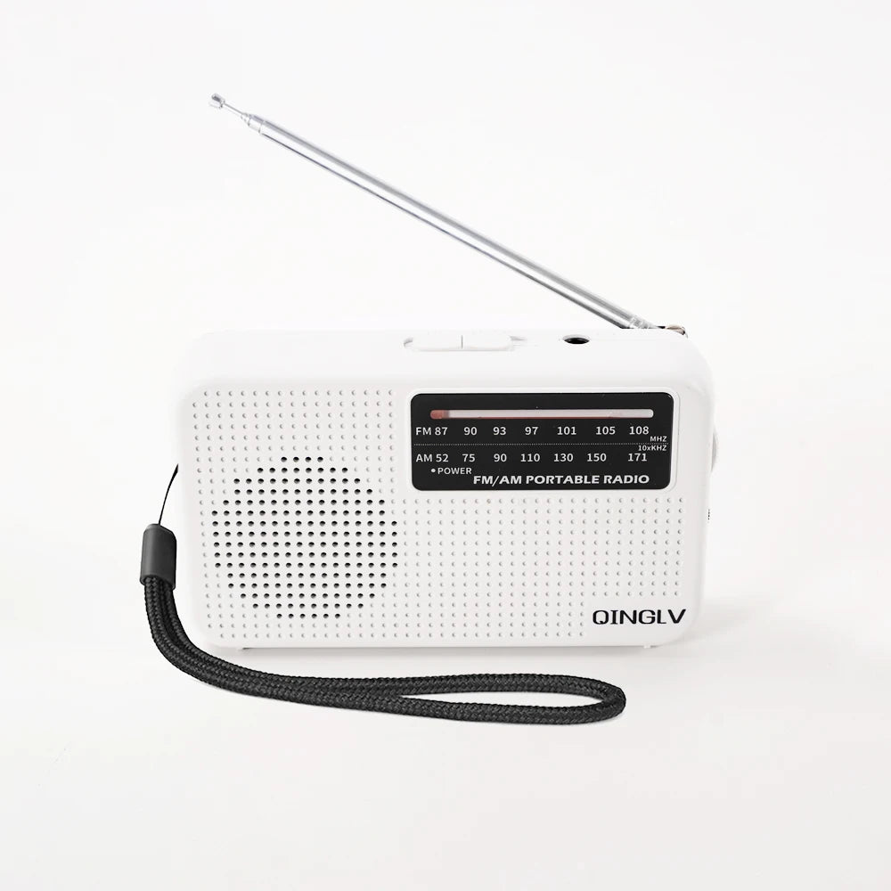 White portable radio with antenna on a white background