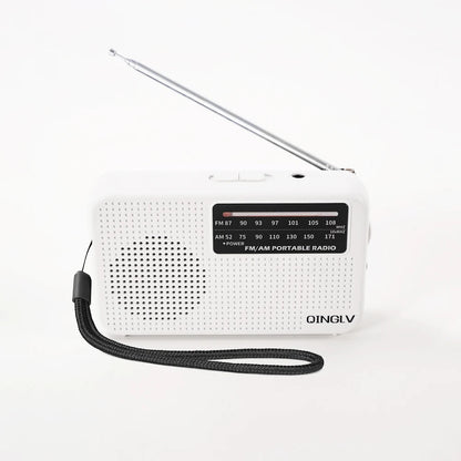 White portable radio with antenna on a white background